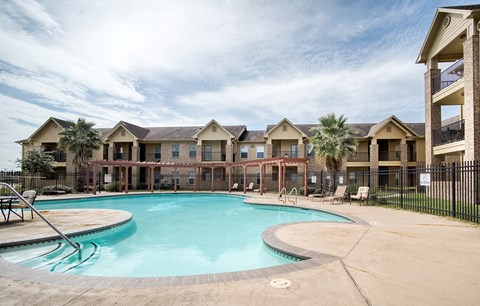 the preserve at ballantyne commons pool and apartment buildings