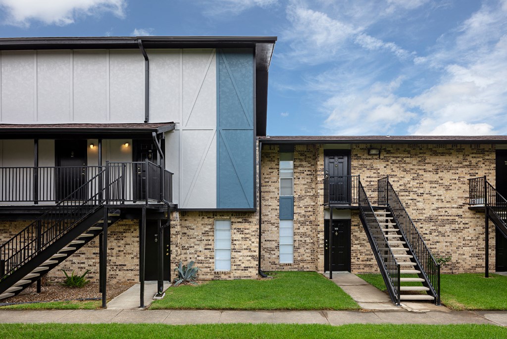a view of a building with a stairway in front of it