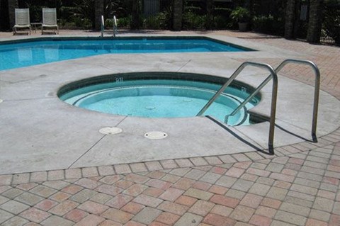 A small pool with a metal ladder.