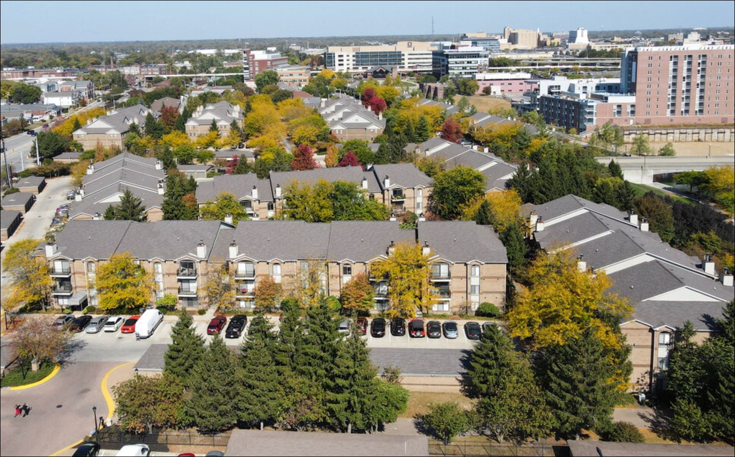 an aerial view of a neighborhood with houses and trees