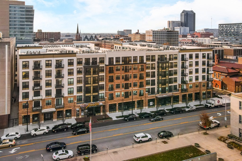 a view of a city from a building overlooking a street