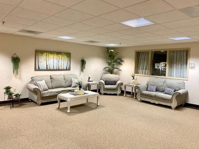 a living room with couches and a table