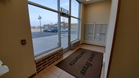 A brown doormat with the words "Please Do Not Enter" written on it.
