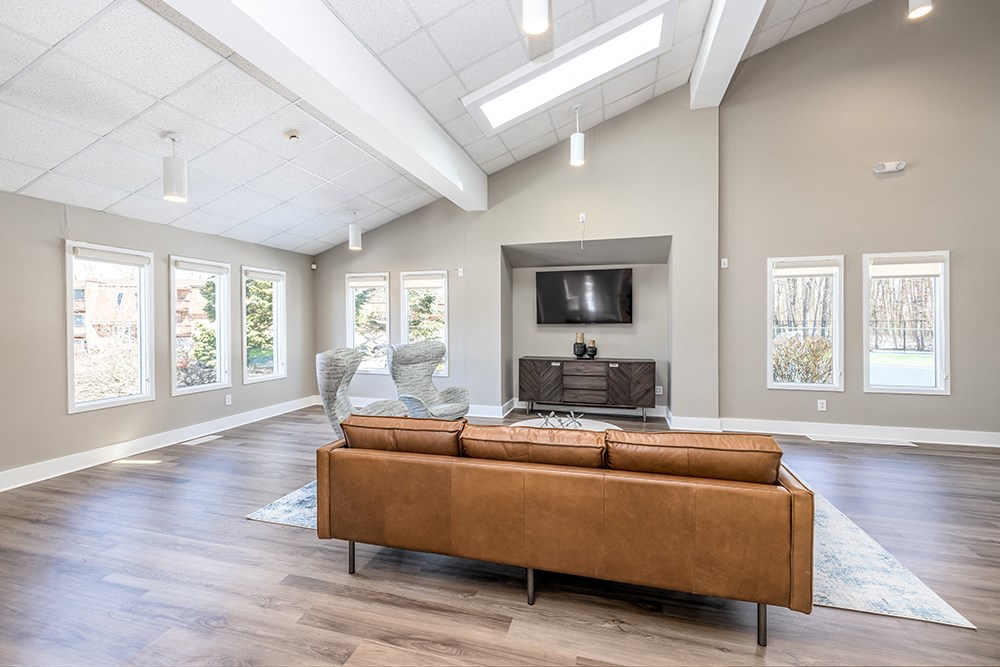 the preserve at ballantyne commons community living room with couch and tv