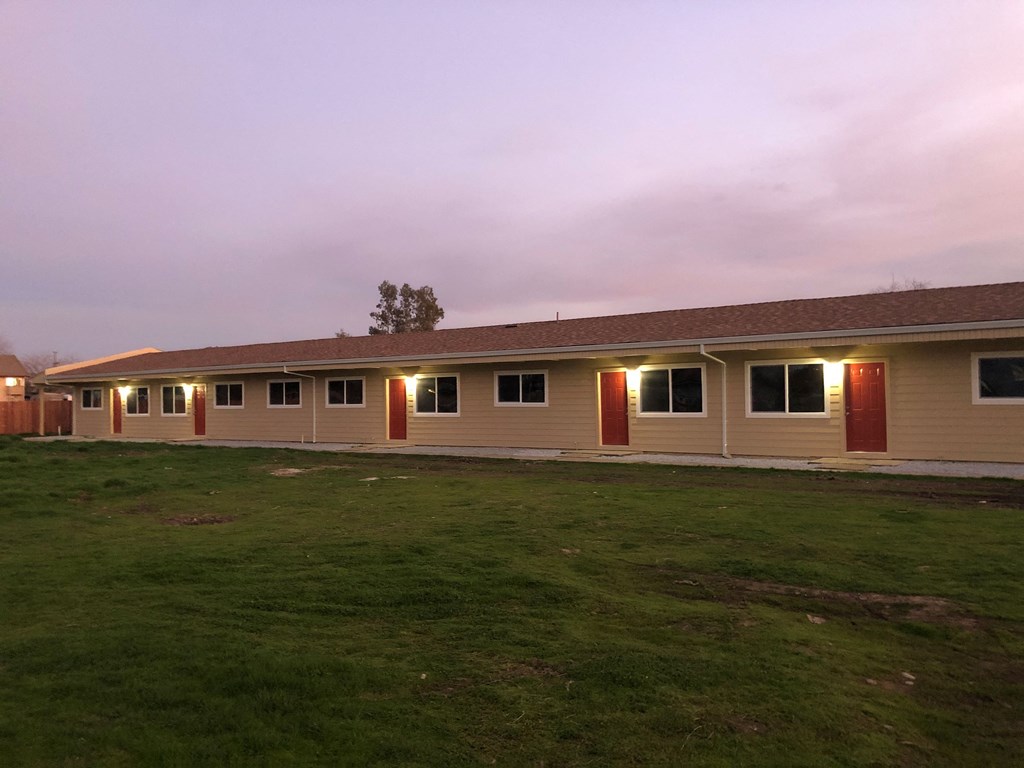 the front of our building at dusk