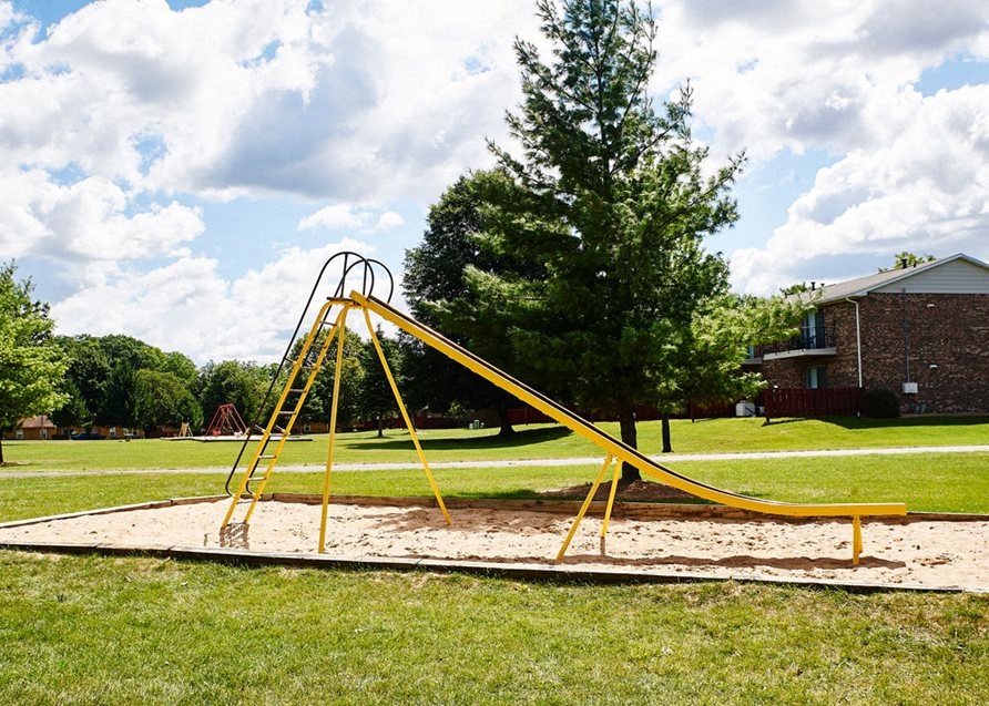 Play Park with slides, swings, and more at Cambridge Square in Grand Rapids