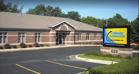 a building with a sign in front of it
