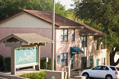 a building with a car parked in front of it