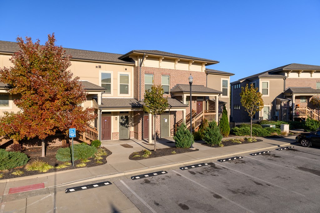 an aerial view of a row of houses on a street