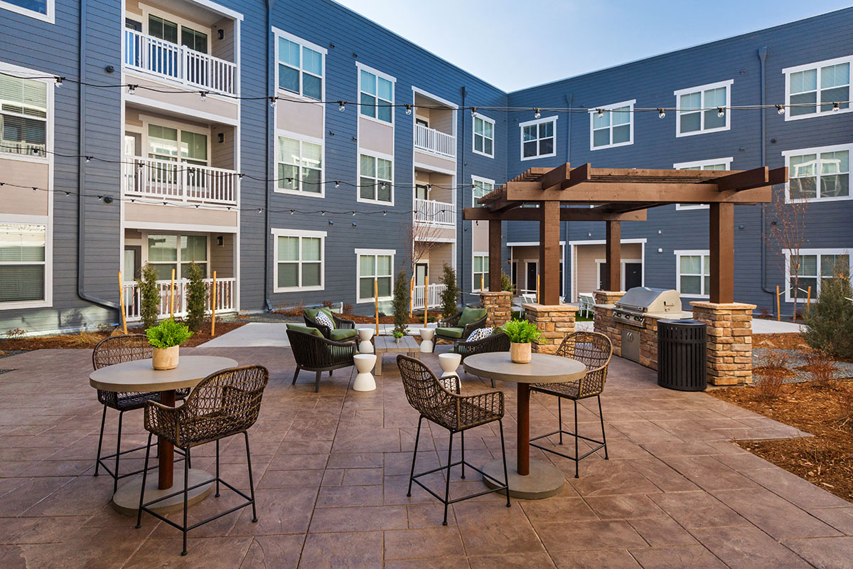 Outdoor BBQ Picnic Tables at CO Springs Apartments Near Seven Bridges Trail