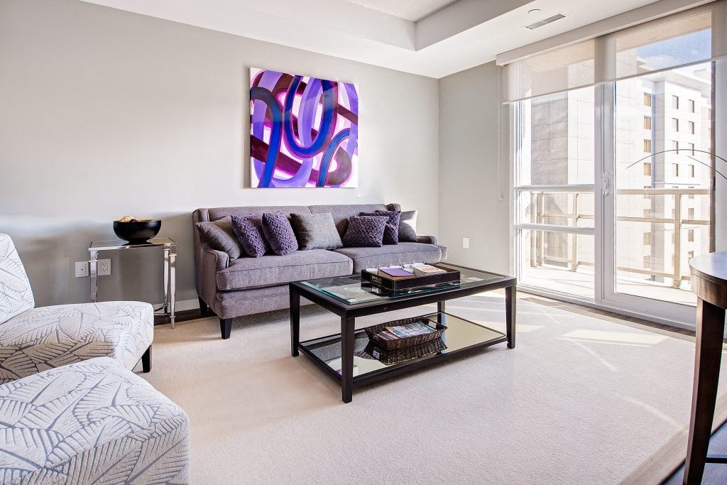 a living room with a couch and a table