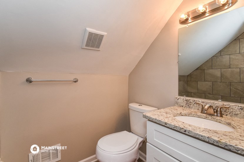 a small bathroom with a toilet and a sink