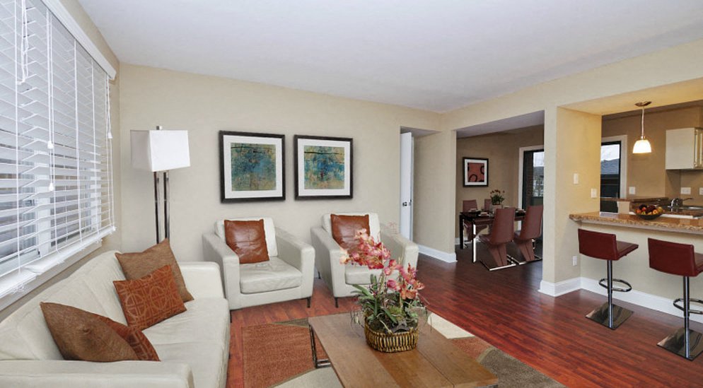 a living room with a couch and a table