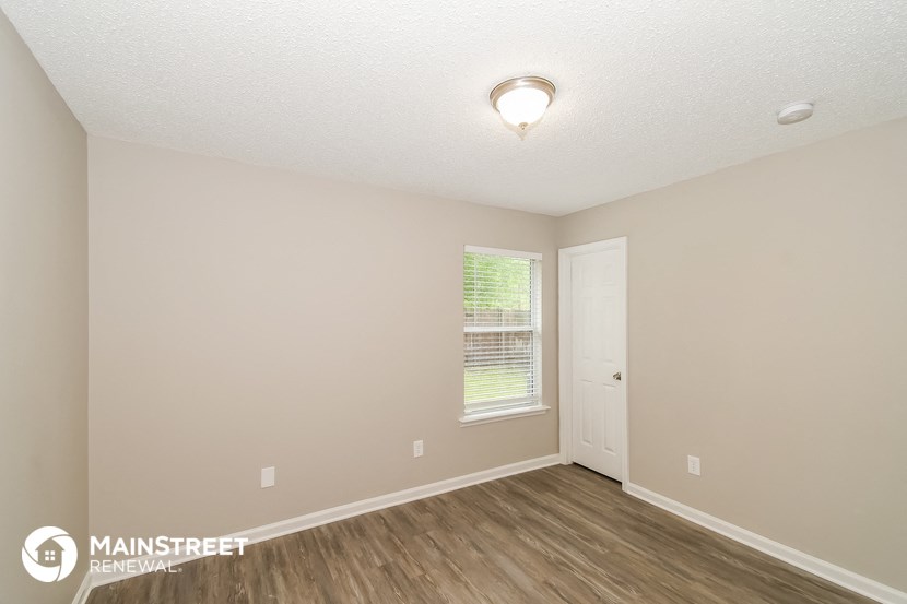 the spacious living room of our studio apartment at university estates affordable housing