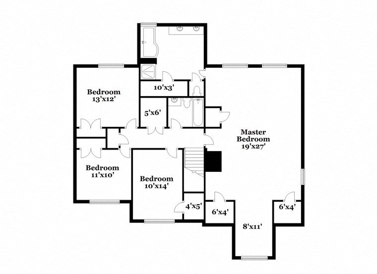 a floor plan of a house with two floors and a staircase