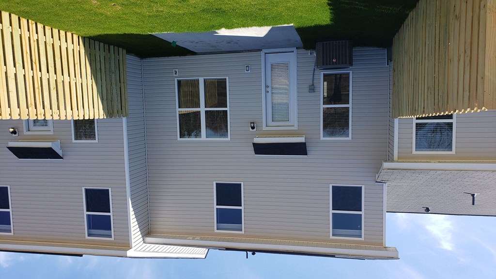 a view of the back of a house from the roof