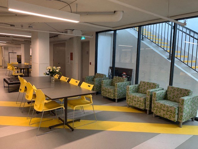 a room with a table and chairs