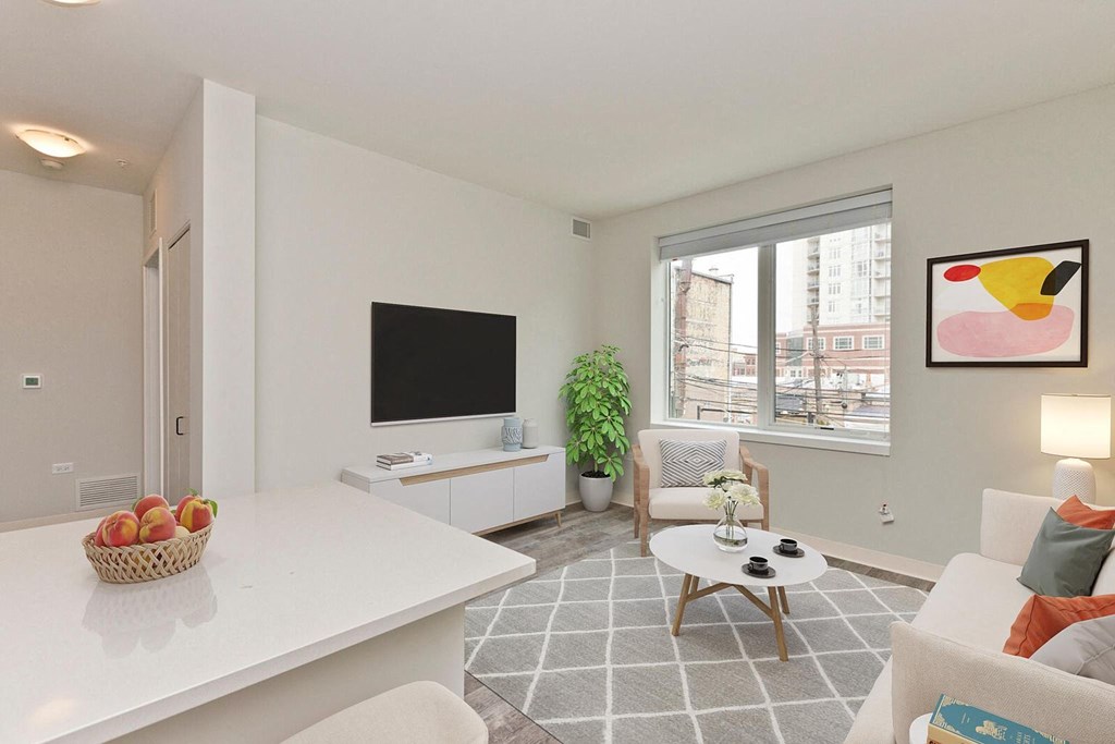 a living room with a couch and a table