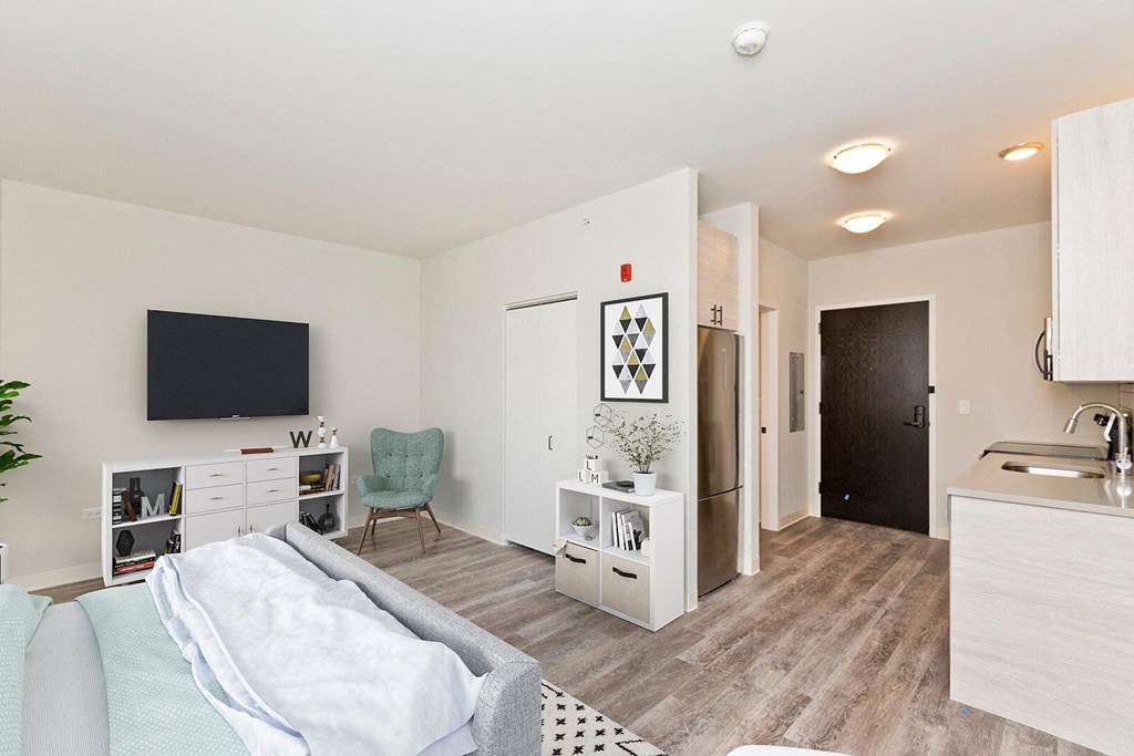 a living room with a couch and a tv