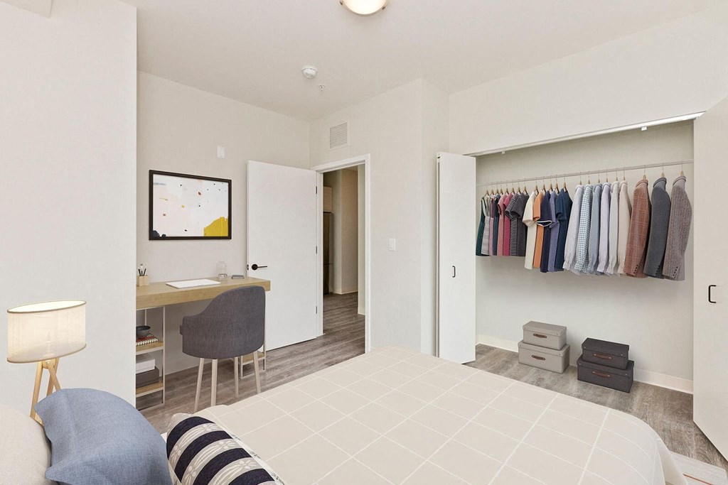 a bedroom with a bed and a closet