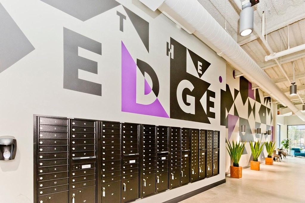 a large locker room with a large mural on the wall