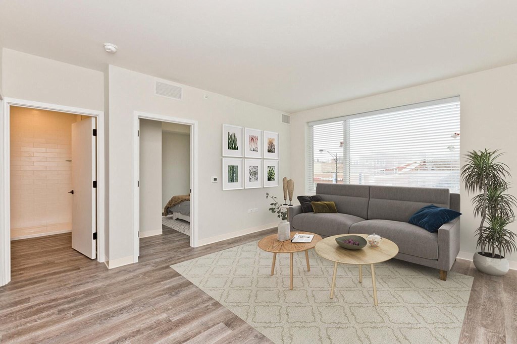 a living room with a couch and a table