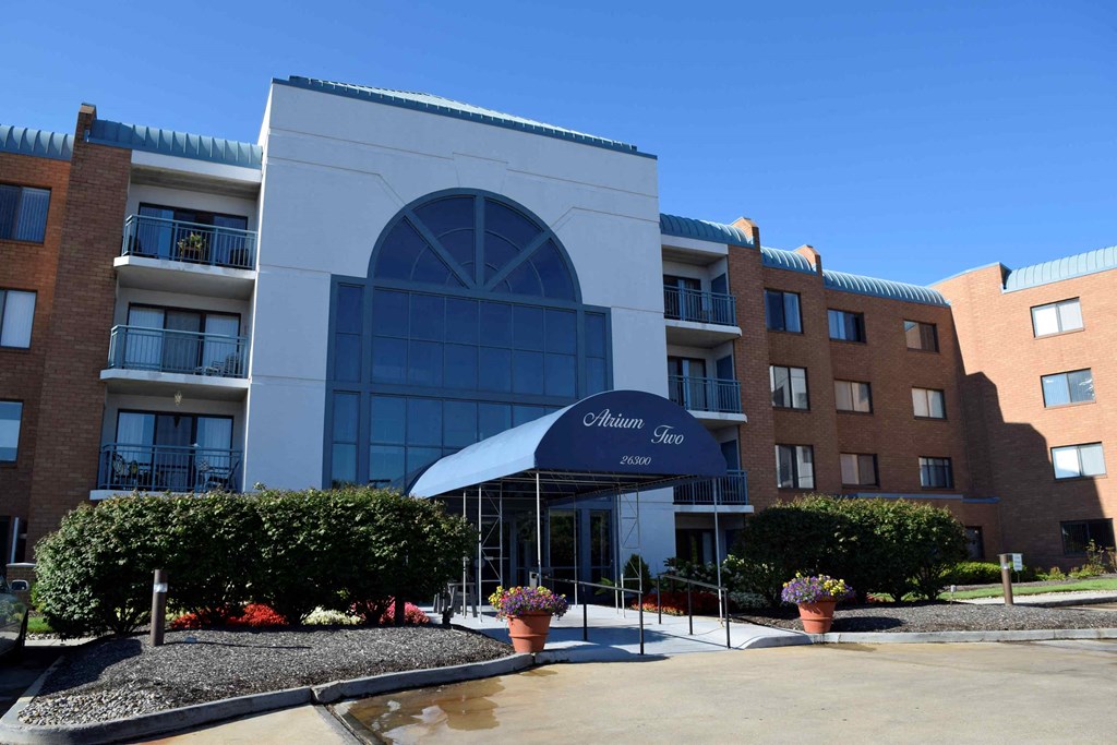 a building with a blue awning in front of it