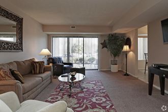 a living room with a couch and a table
