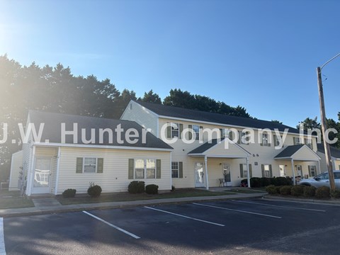 The image shows a building with the name J.W. Hunter Company Inc. on it.