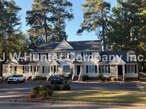 A house with the name J.W. Hunter Company Inc written on it.