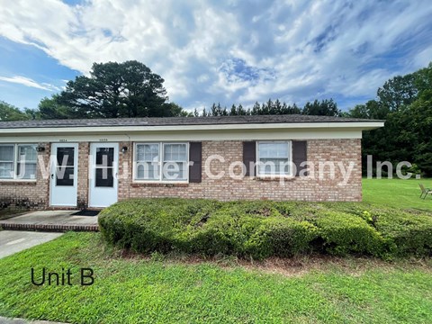 A house with the text "Winter Company Inc." on the side.