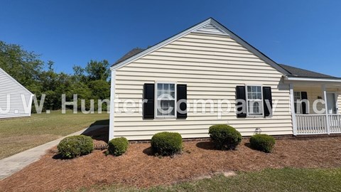 A house with the name J.W. Hunter Company Inc. on the front.