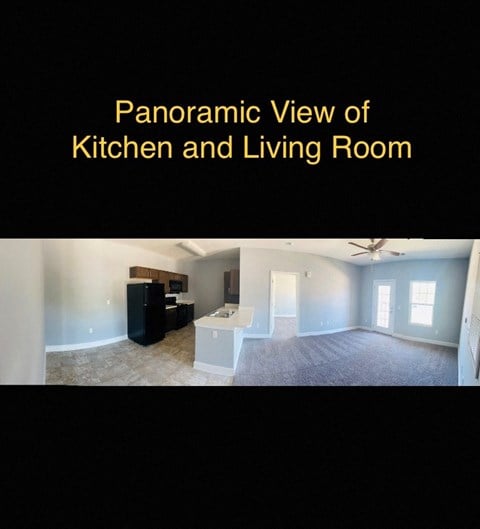 a panoramic view of a kitchen and living room