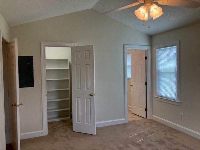 an empty room with a closet and a door