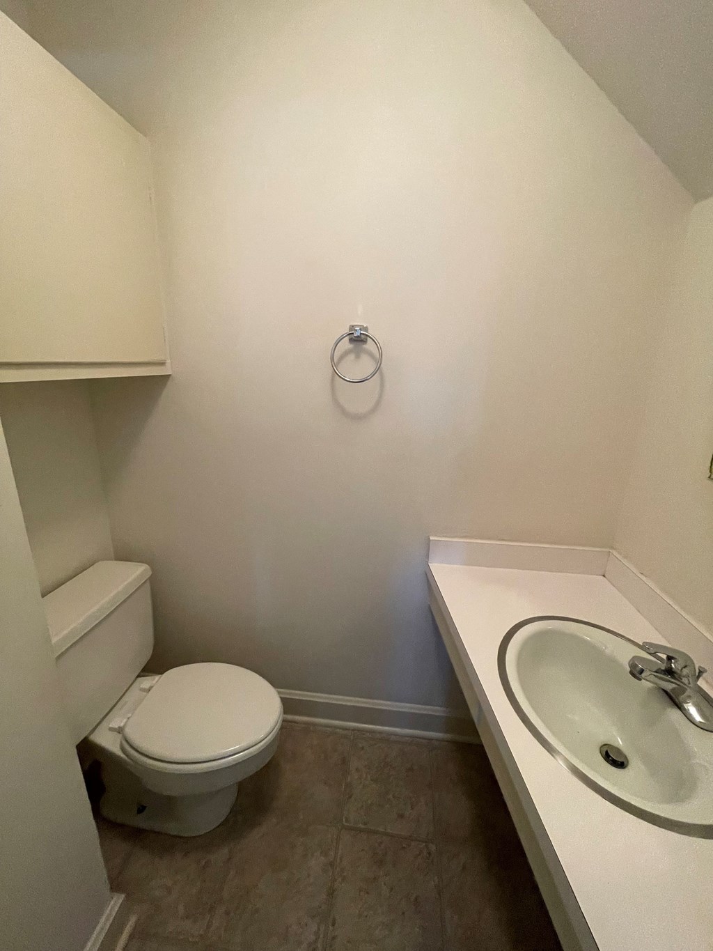 a small bathroom with a toilet and a sink