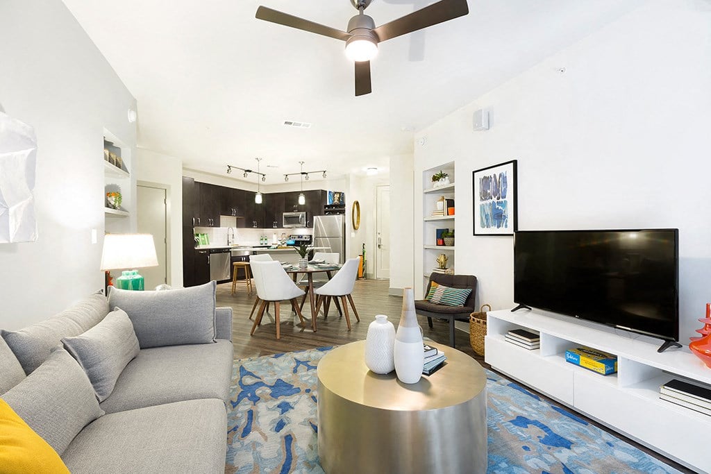 a living room with a couch and a tv