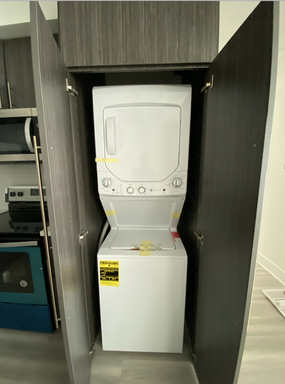 the washer and dryer in the closet in our room