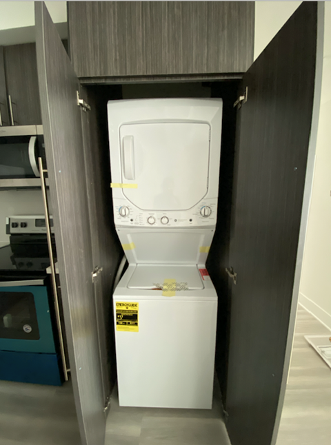 the washer and dryer in the closet in our room