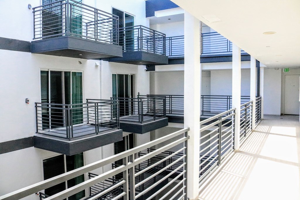 a view of the balconies of an apartment building