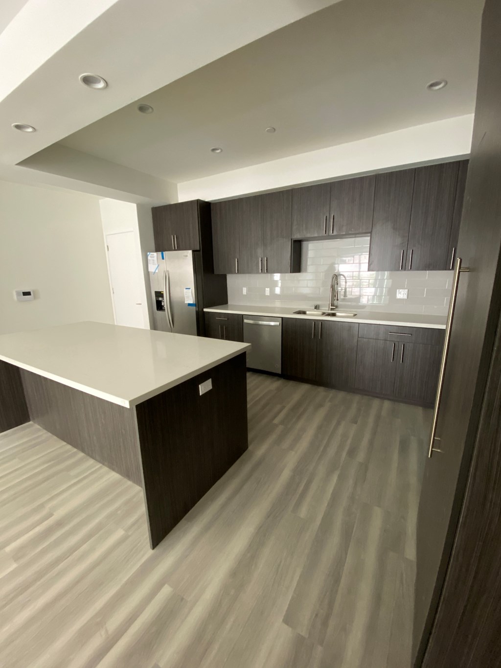 a view of the kitchen in a new home