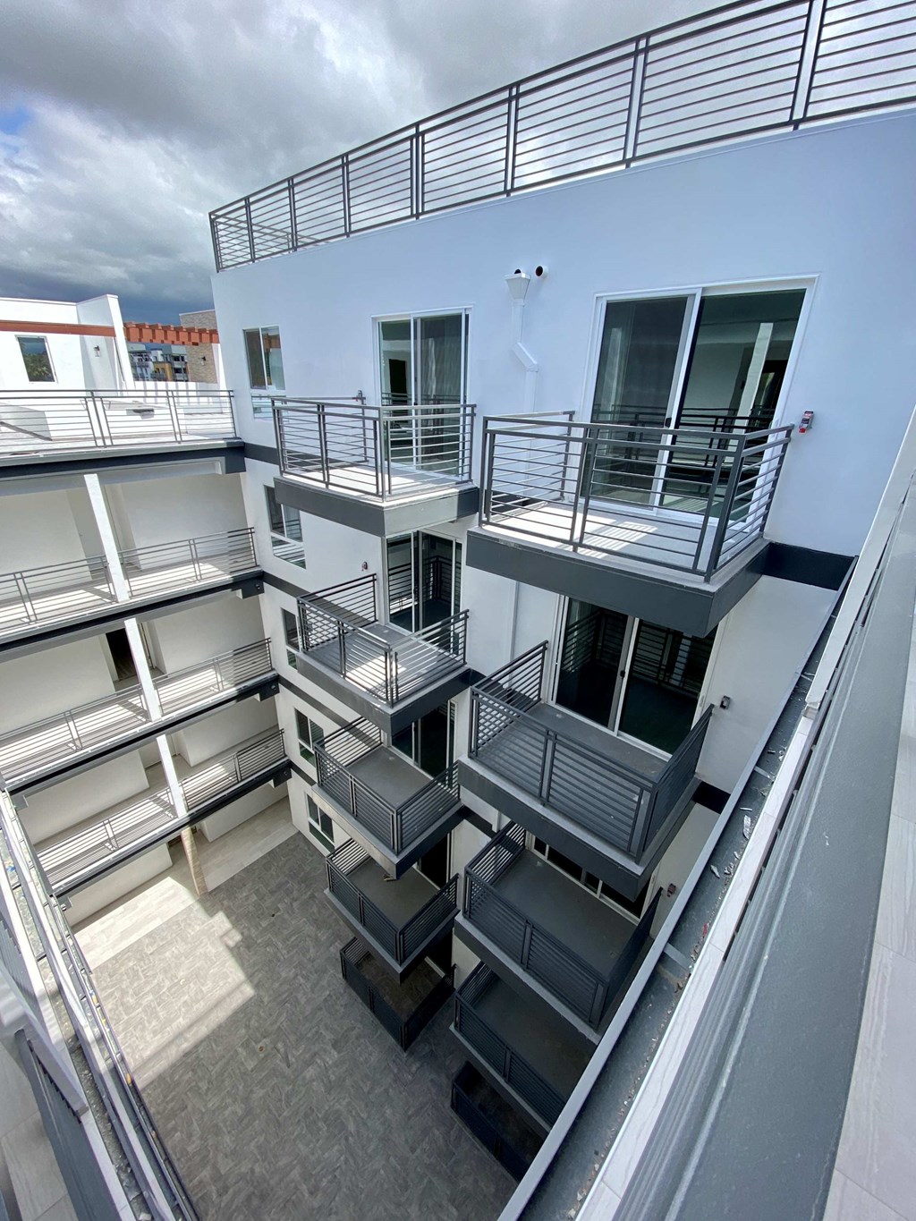 a view of a building with balconies on it