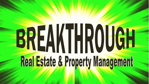 A green and black banner with the words "BREAKTHROUGH Real Estate & Property Management".