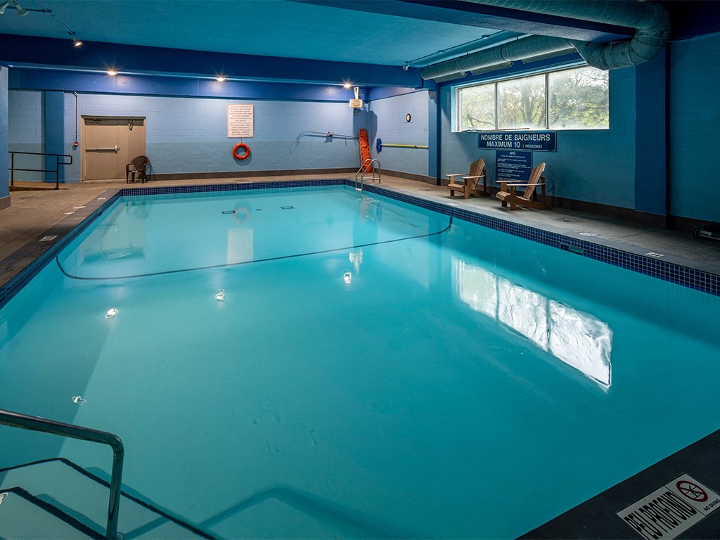 a swimming pool with a blue pool