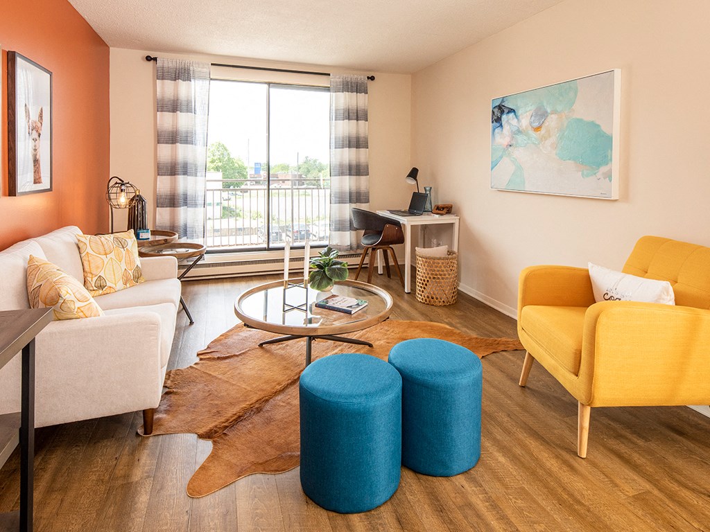 a living room with a couch and a table