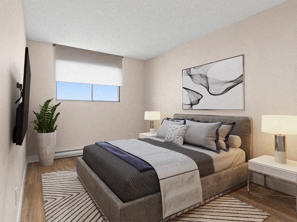 a bedroom with a large bed and a window