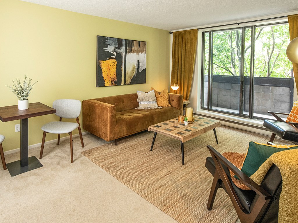 a living room with a couch and a table