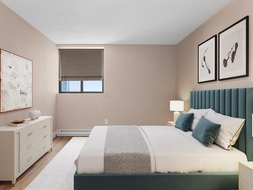 a bedroom with a large bed and a window