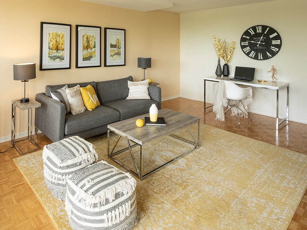 a living room with a couch and a table