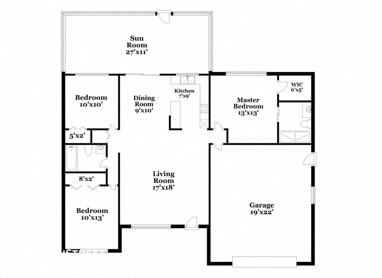 a floor plan of a house with two floors and a garage