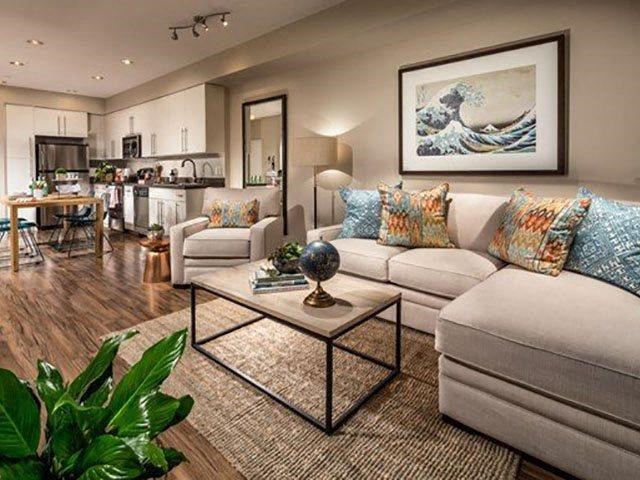 a living room with a couch and a table